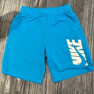 Blue and white Nike basketball shorts.